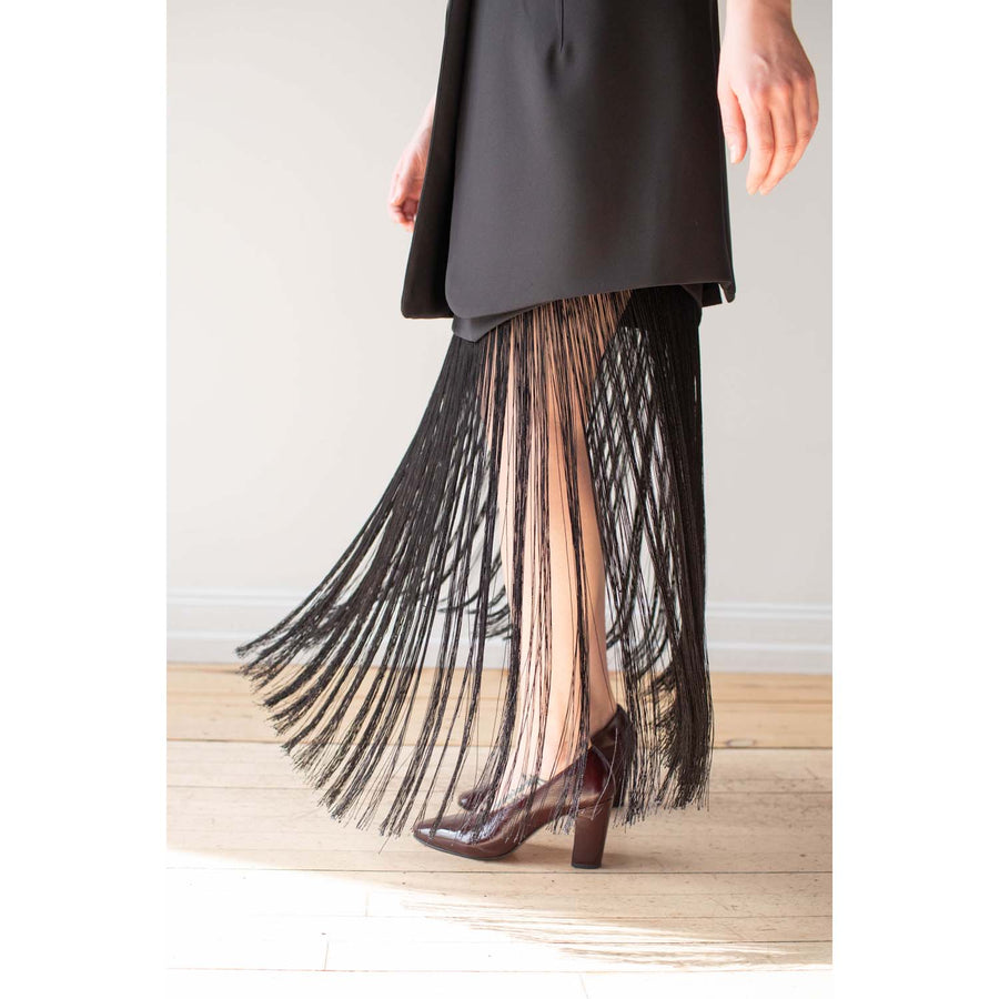 Nomia Asymmetric Fringe Skirt in Black