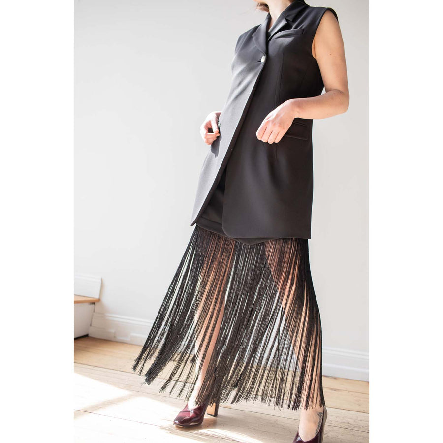 Nomia Asymmetric Fringe Skirt in Black