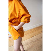 Toit Volant Jenny Running Shorts in Tangerine