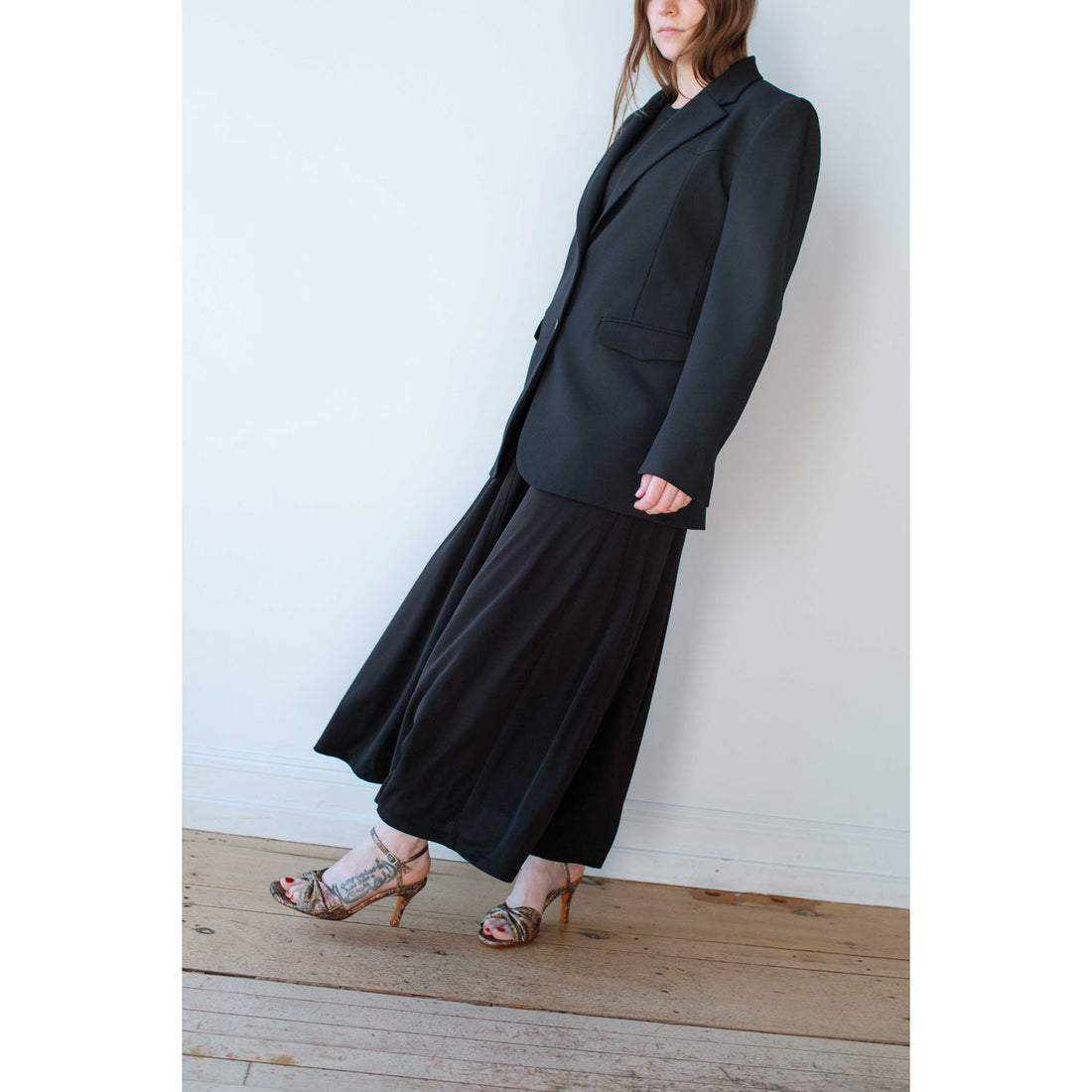 Nomia Seamed Flared Maxi Dress in Black